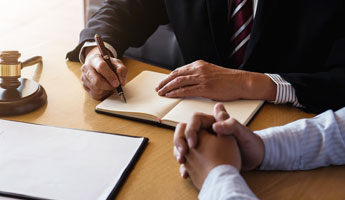 Male Lawyer Consulting With Client